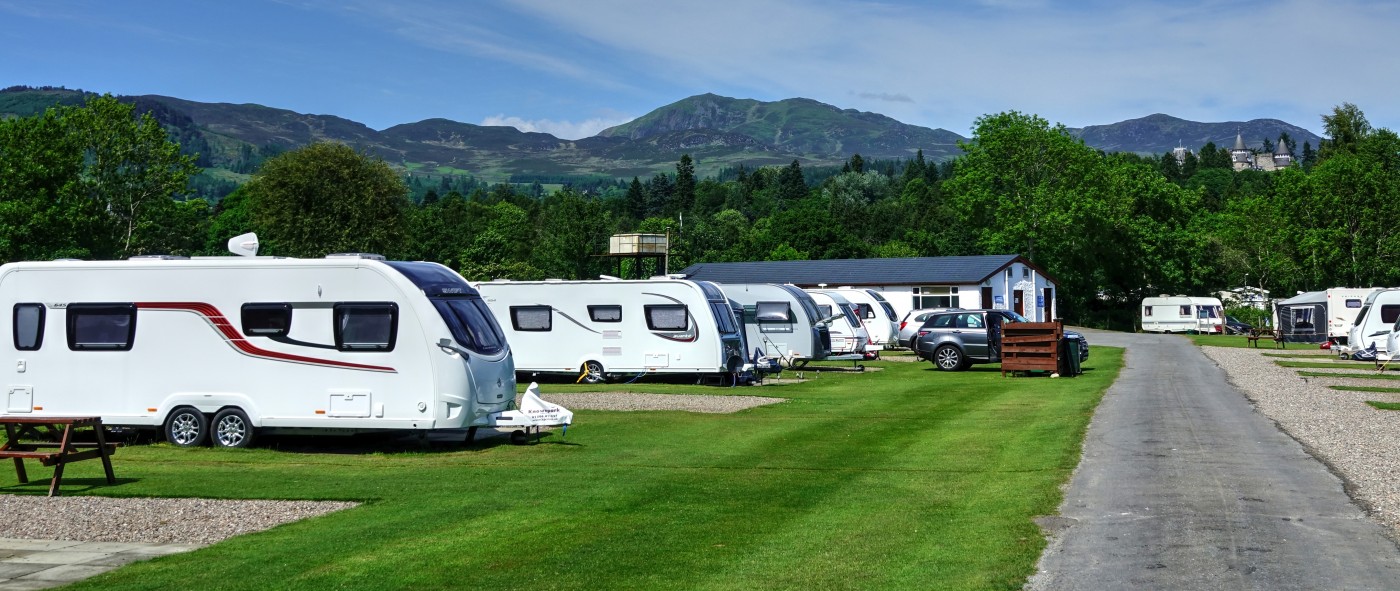 We welcome touring caravans, camper vans and motor homes to our well serviced parkland areas with great views of the surrounding hills of Highland Perthshire.