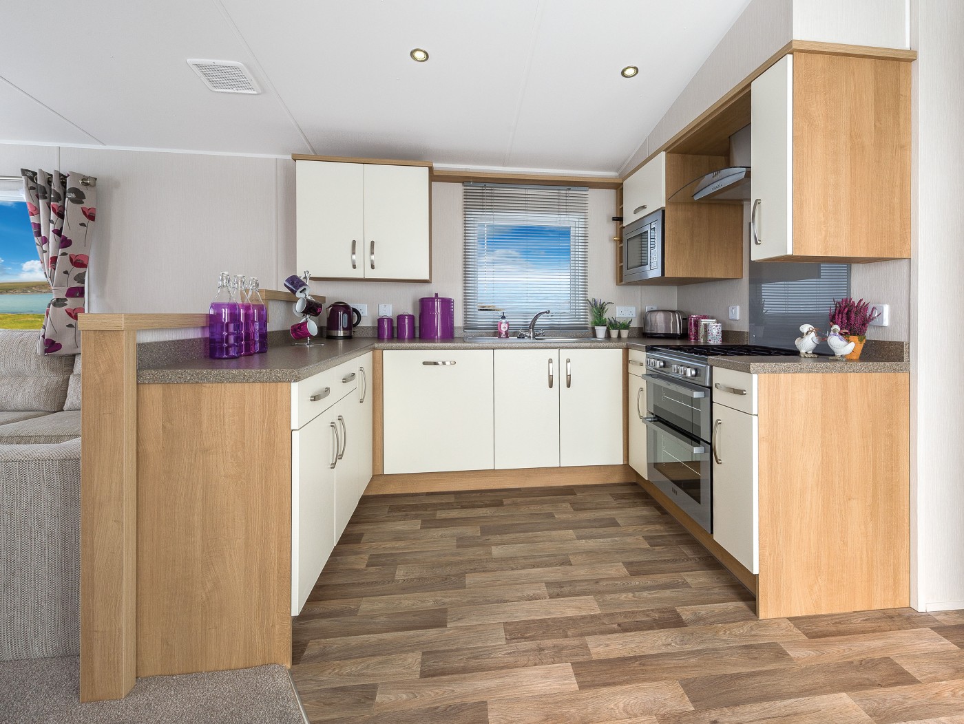You will have a fantastic view of Ben Y Vrackie from the Willerby Avonmore. It has two bedrooms and an open plan kitchen/living room layout. 
Bedroom 1 – Double
Bedroom 2 – Twin. 
The living area can accommodate a further two people by setting up the sofa bed.