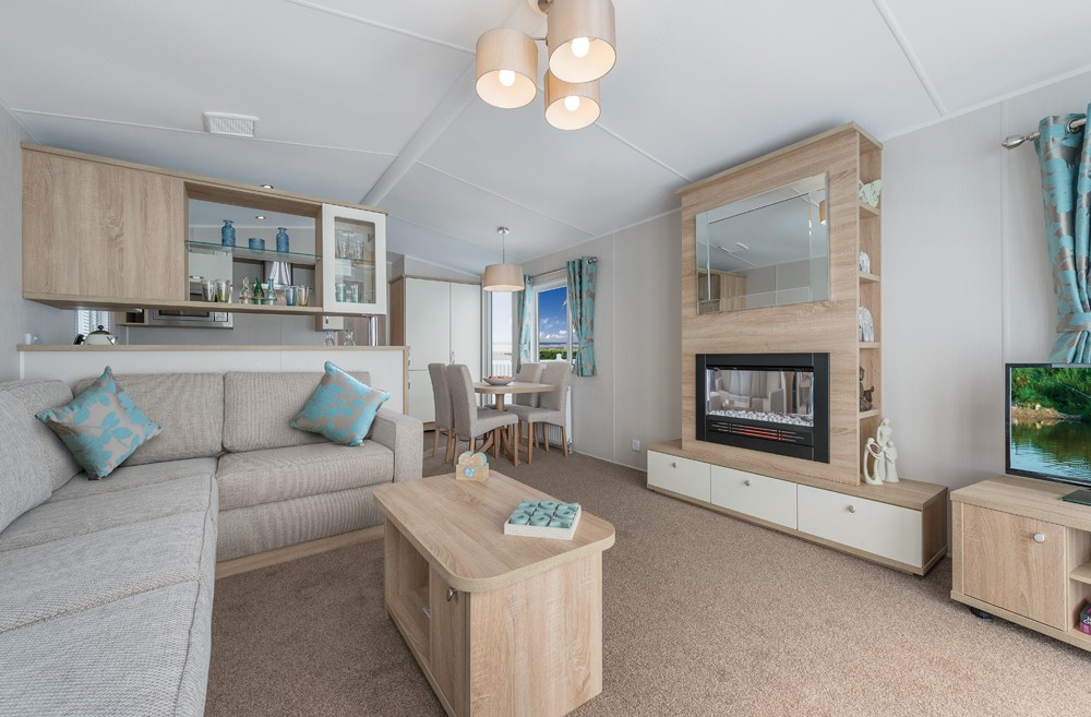The 2016 Willerby Avonmore offers views of the grassy park from the large windows . It has two bedrooms and an open plan kitchen/living room layout. Bedroom 1 – Double, Bedroom 2 – Twin. All our caravans are built and fitted to the highest standards