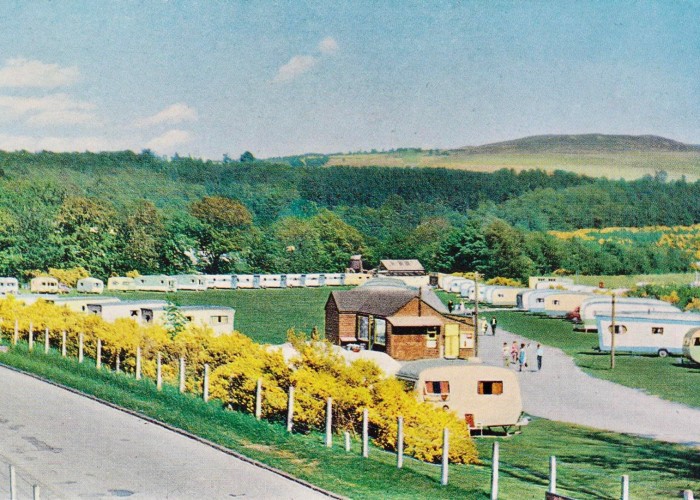 A historical photograph from Fonab Caravan Park. A landscape image of the site with caravans and campers from the 1960's.